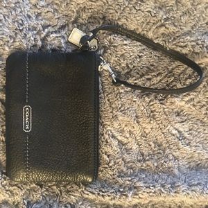 Coach wristlet, black with emerald green lining